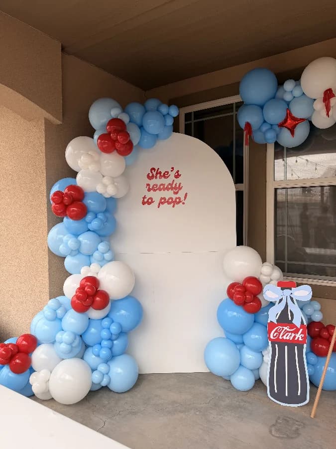 Single Arch w/ Balloon garland, Custom sign, & Large prop